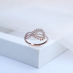 Load image into Gallery viewer, 14K Rose Gold Infinity Ring with CZ Stones