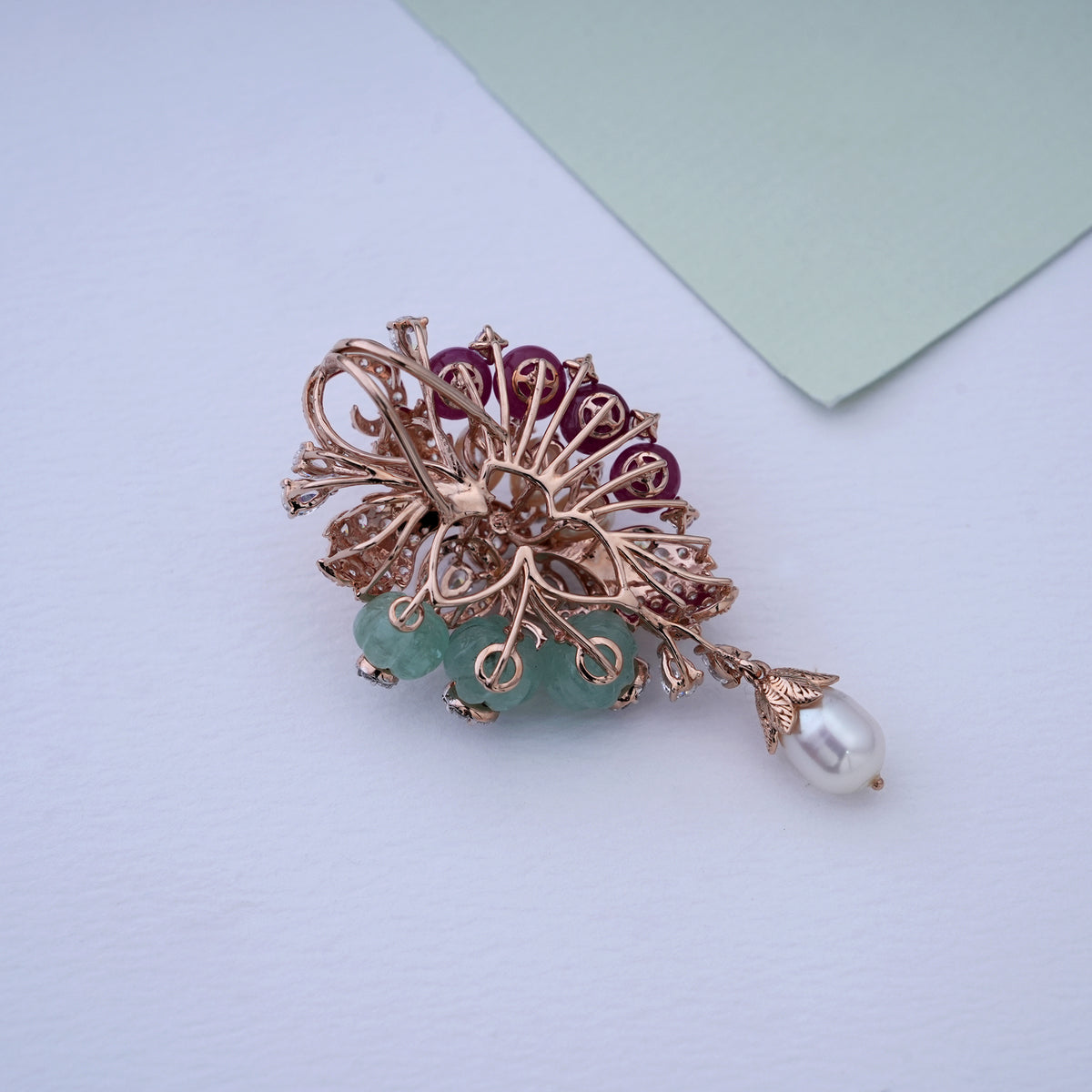 18k gold locket with multicolor cz stones