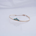 Load image into Gallery viewer, 18K Gold Bangle with Blue Stones