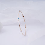 Load image into Gallery viewer, 18K Gold Bangle with Blue Stones