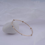 Load image into Gallery viewer, 18K Gold Bangle with Blue Stones Caia