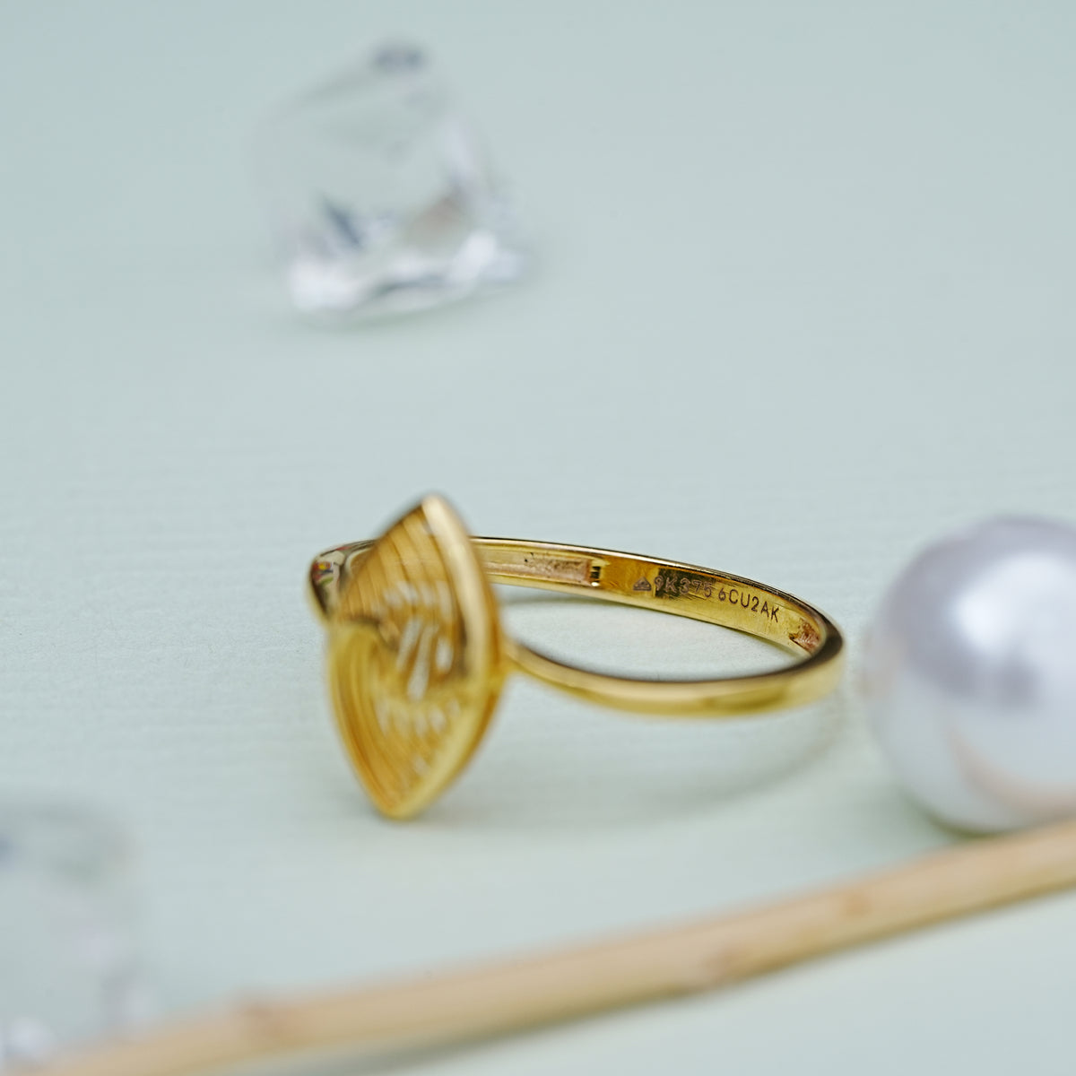9k gold eye shaped ring for office wear