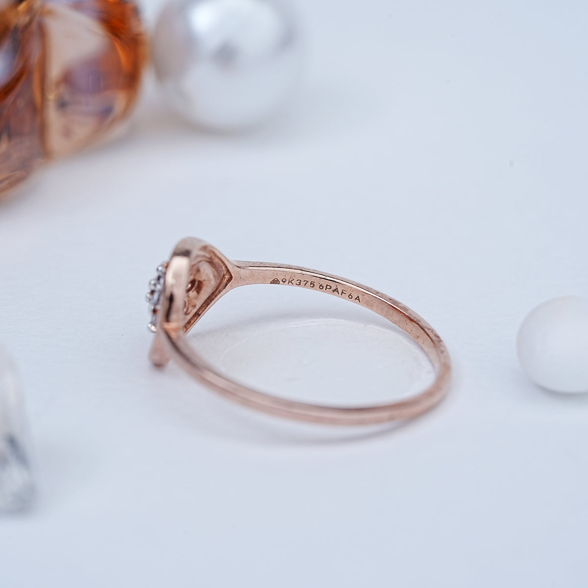9k rose gold ring with cz stones