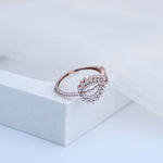 Load image into Gallery viewer, 14K Rose Gold Infinity Ring with CZ Stones
