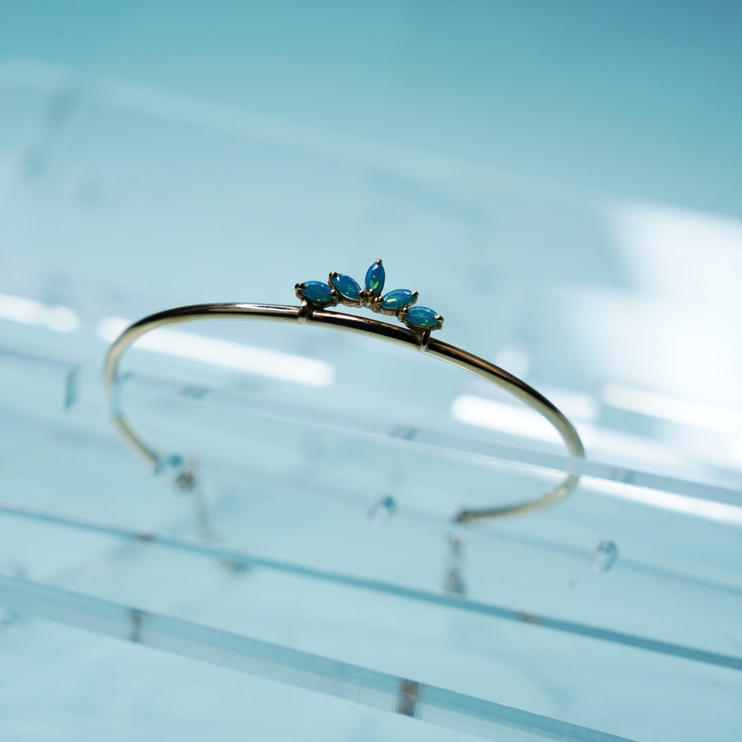18K Gold Bangle with Blue Stones