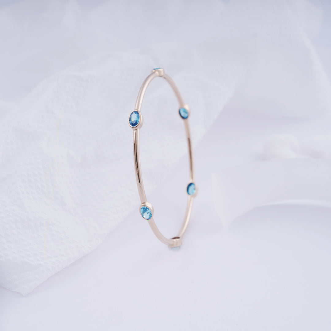 18K Gold Bangle with Blue Stones