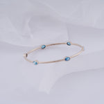 Load image into Gallery viewer, 18K Gold Bangle with Blue Stones
