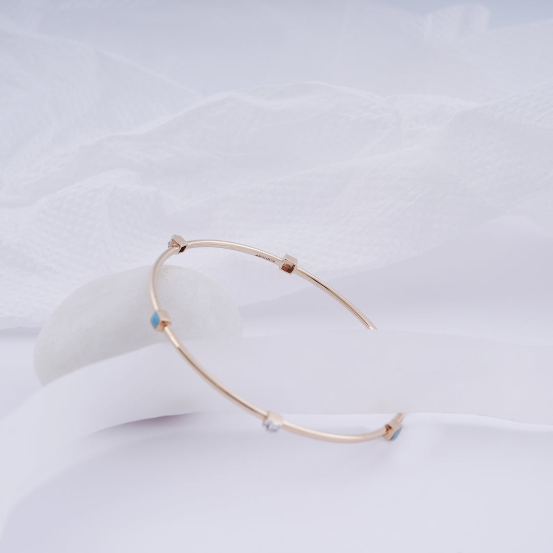 18K Gold Bangle with Blue Stones