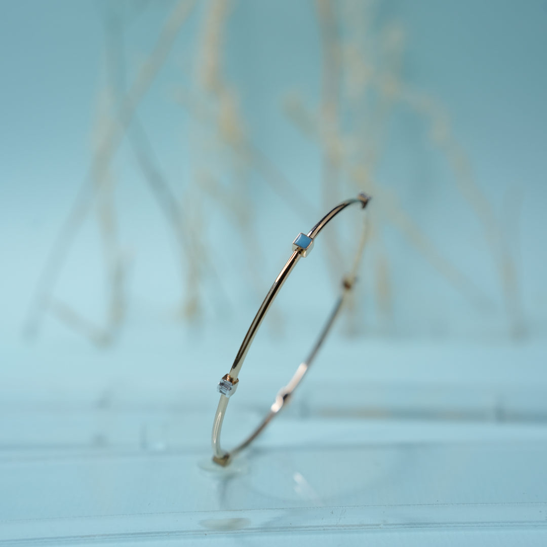 18K Gold Bangle with Blue Stones