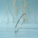 Load image into Gallery viewer, 18K Gold Bangle with Blue Stones

