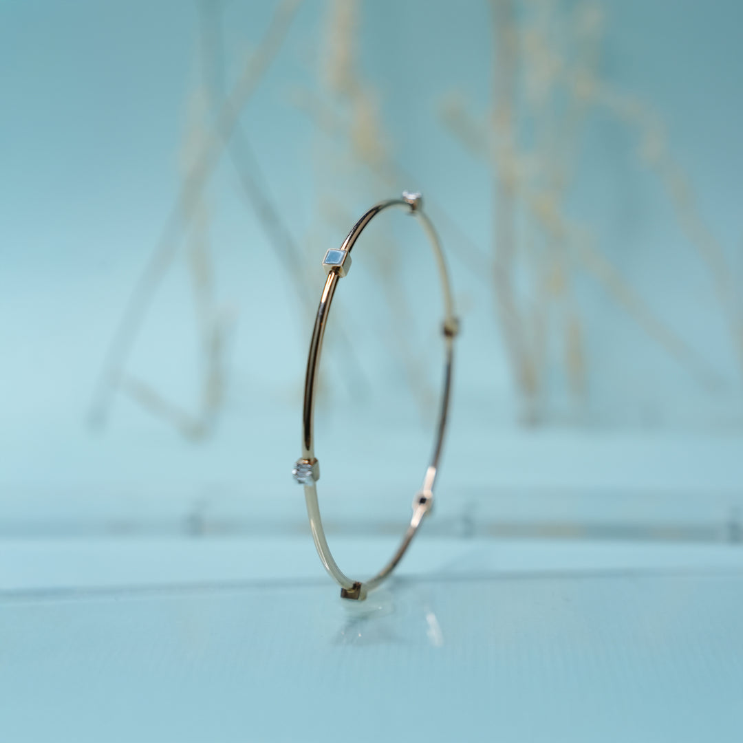 18K Gold Bangle with Blue Stones