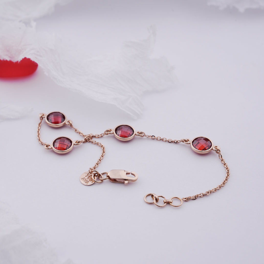 18K Gold Bracelet with Red Stones