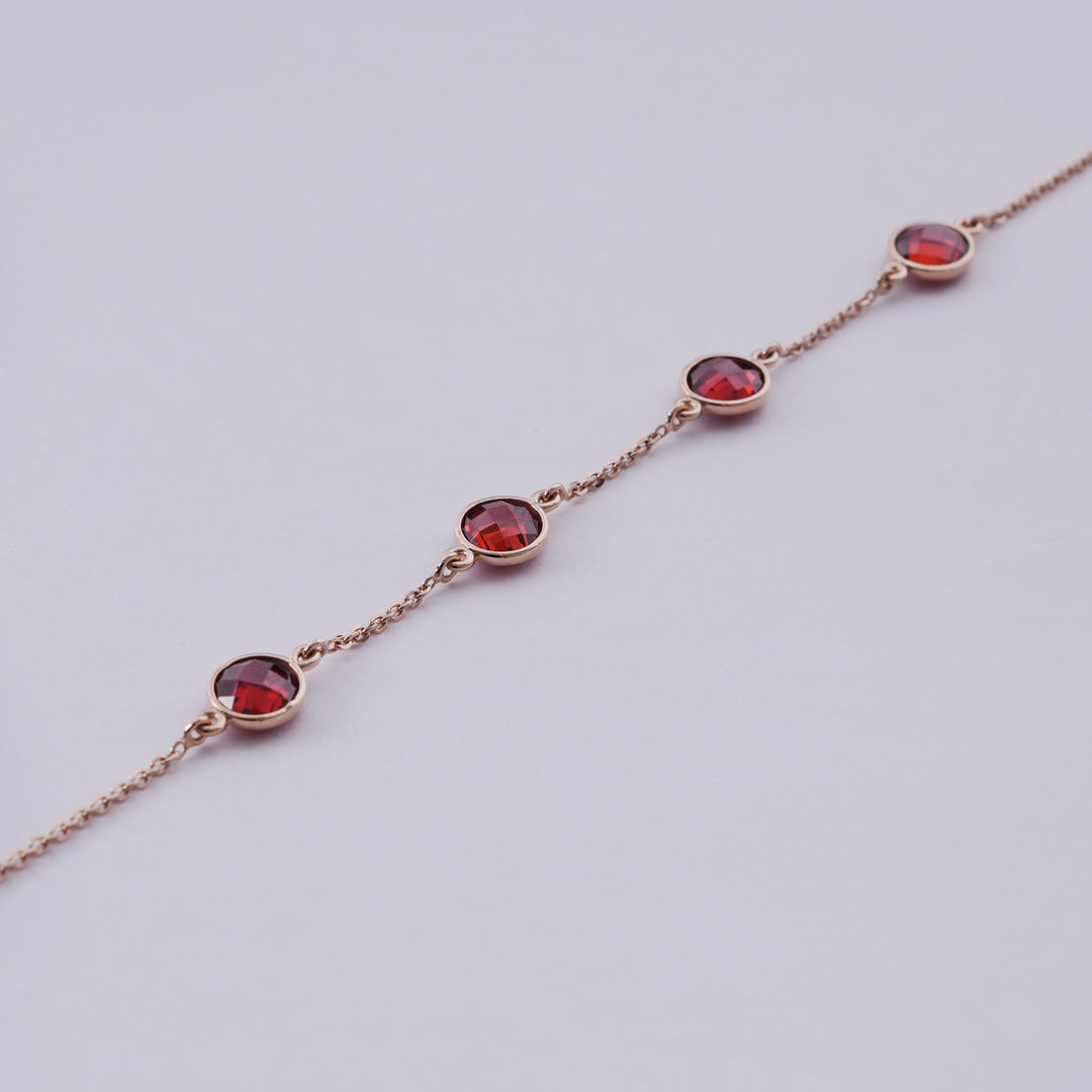 18K Gold Bracelet with Red Stones