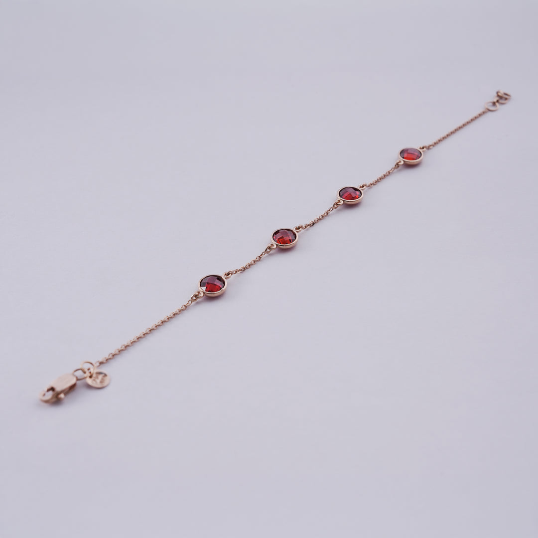 18K Gold Bracelet with Red Stones