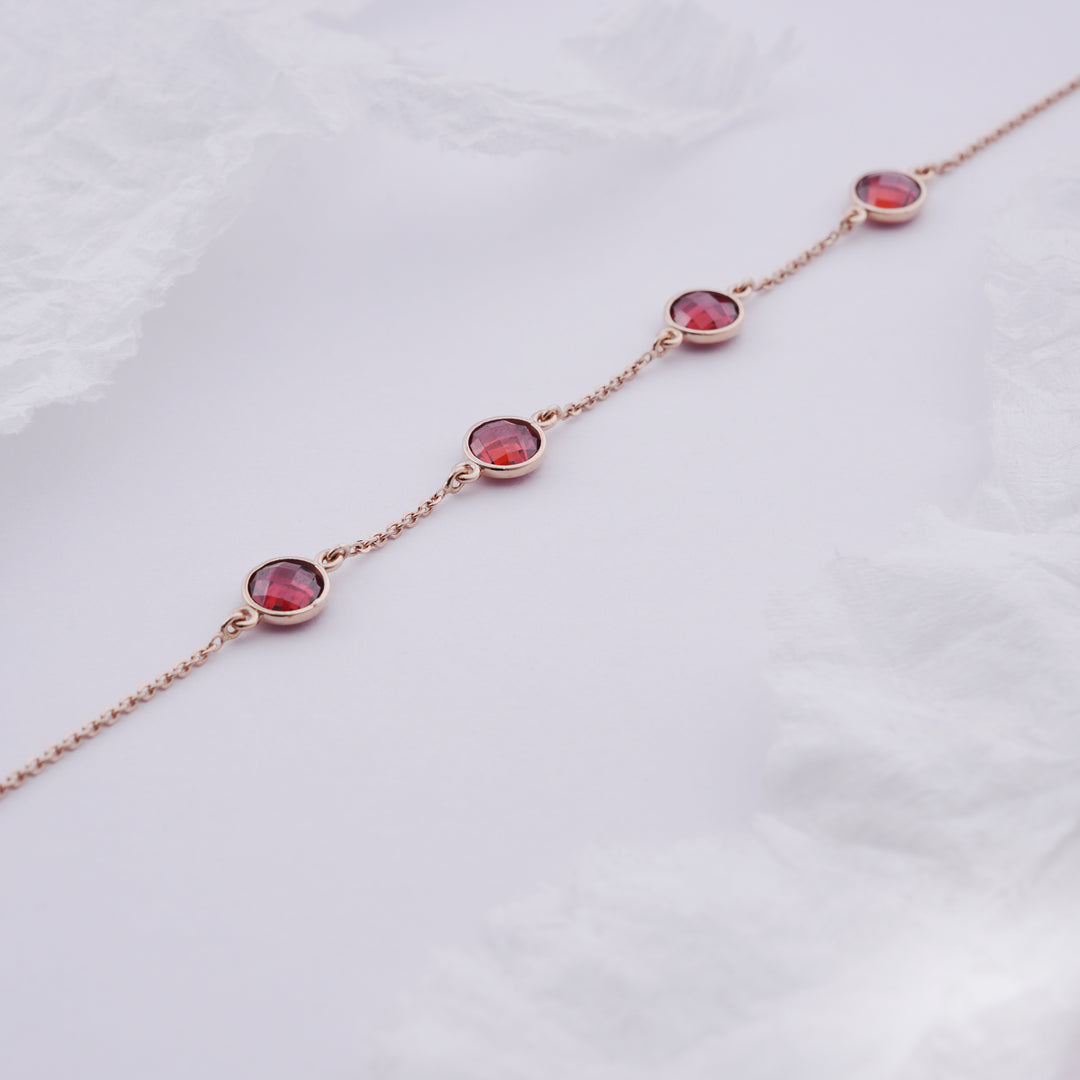 18K Gold Bracelet with Red Stones