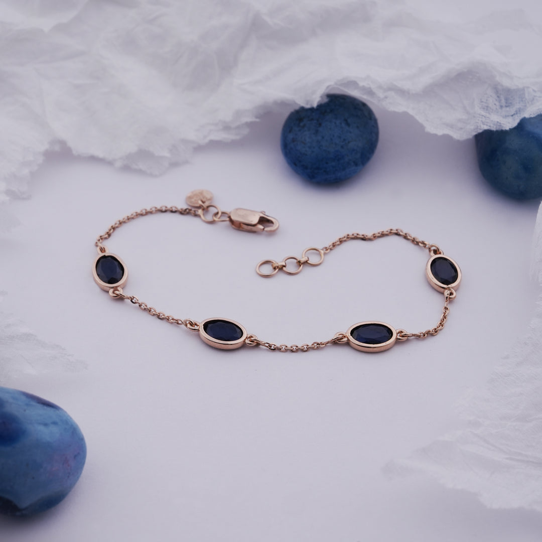 18K Gold Bracelet with Solid Navy Blue Stones