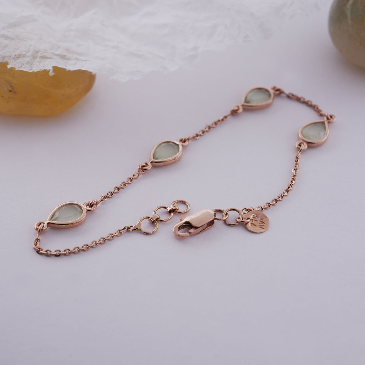 18k gold bracelet with pastel green stones