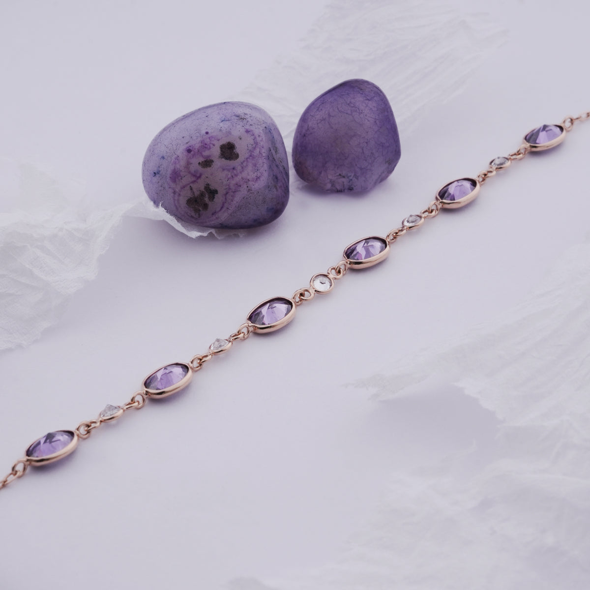 18k gold bracelet with purple stones