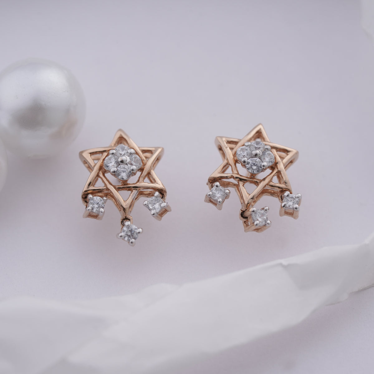 18k gold star shape stud earrings with cz stones