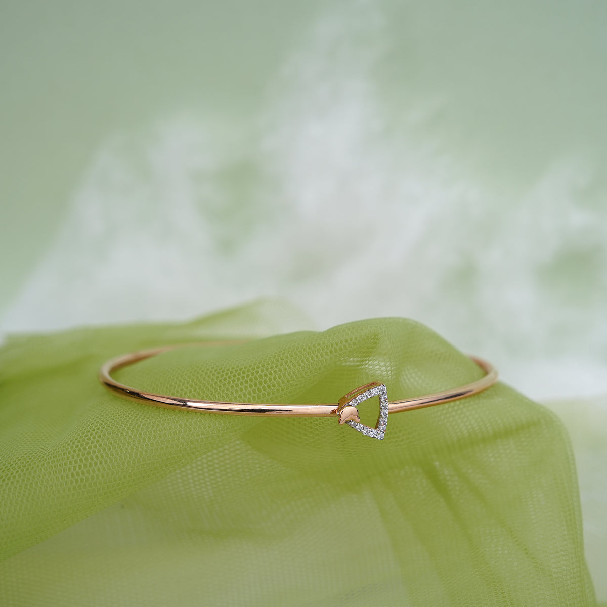 9k rose gold bangle with cz stones for office wear