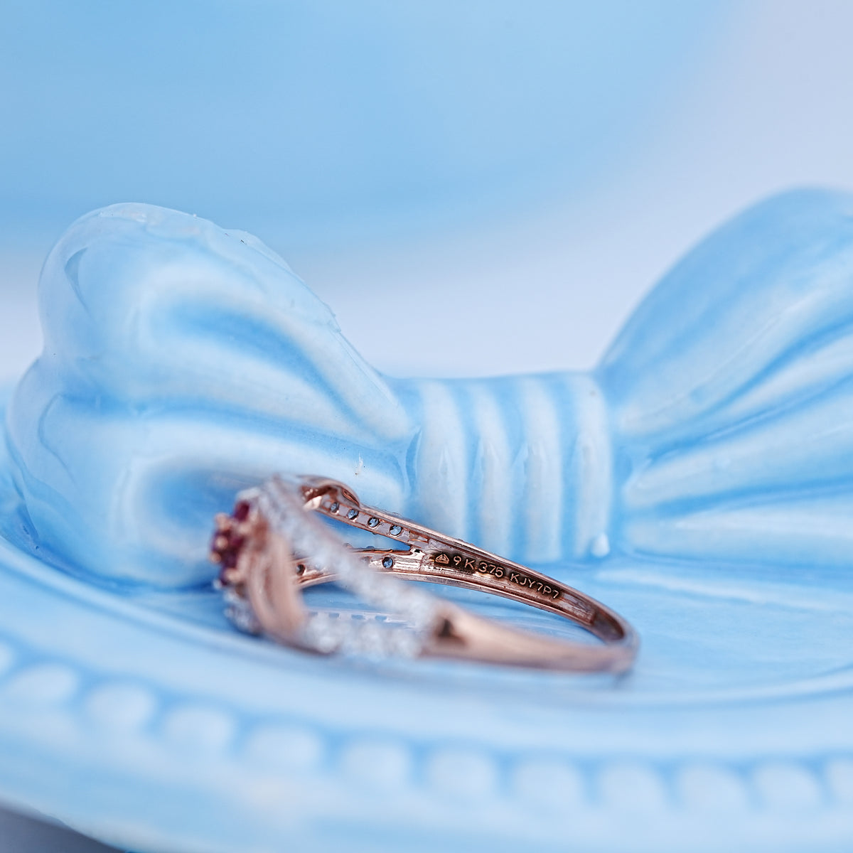 9k rose gold ring with multicolour stones