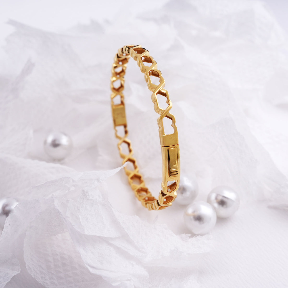 Caia 9kt gold bangle